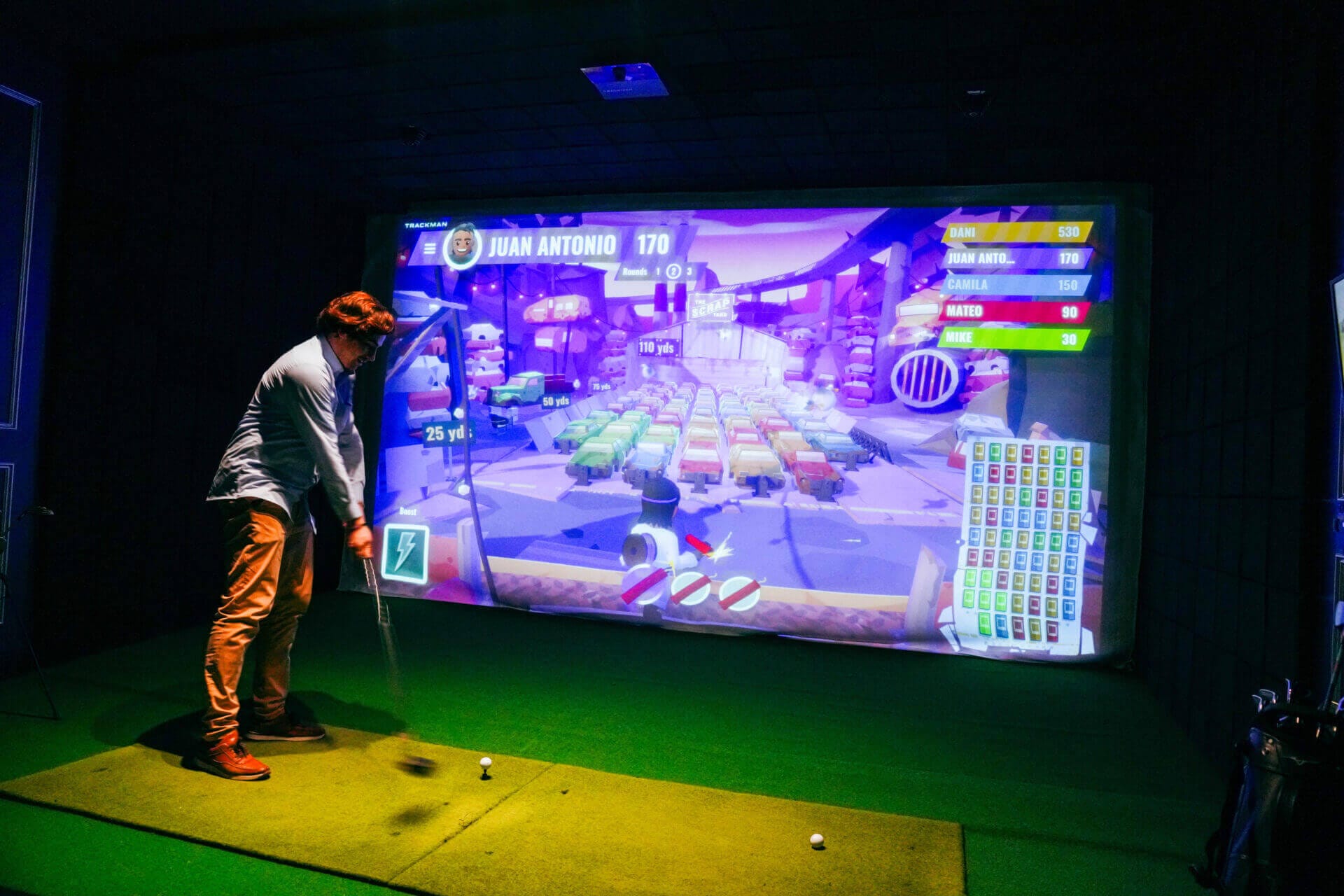 Guest playing a Trackman mini-game